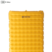 The NEMO Equipment Tensor™ Trail Ultralight Insulated Sleeping Pad is a rectangular yellow inflatable pad with horizontal baffles, top-corner valve, and centered logo. R-value 2.8 shown in the corner; part of the Tensor Trail series.