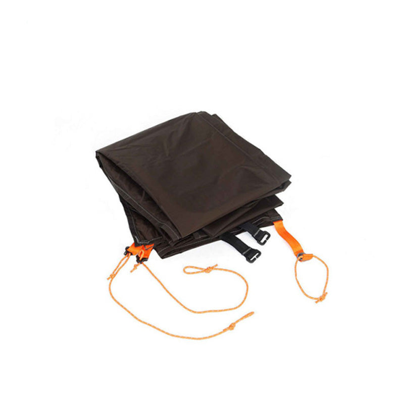 The NEMO Equipment Tracker OSMO™ Footprint, a dark brown waterproof fabric groundsheet with attached orange straps and cords, is shown folded on a plain white background.