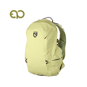 The NEMO Equipment Resolve™ 15L Endless Promise® Technical Active Daypack, in light yellow with a grid pattern and exclusive fabric, features the NEMO logo. Shown on a white background with a green logo in the top left corner.