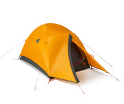 A bright orange NEMO Equipment Kunai™ 3–4 Season Backpacking Tent, designed for versatile year-round backpacking, is set up with its door partially open and guy lines staked out against a plain white background.